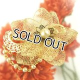 パーティ,フォーマルに最適 RYOKO KIKUCHI(リョウコキクチ)フラワーブーケ型パールのブローチ